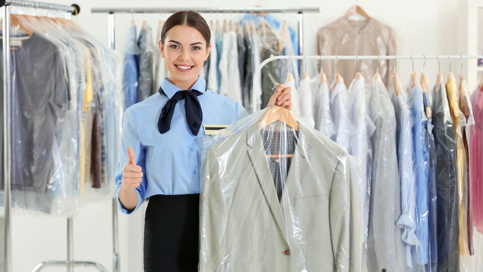 Female Worker in Dry Cleaning Service