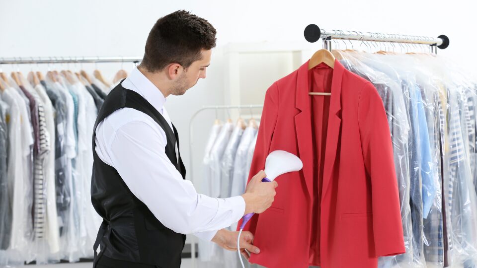 Man Dry Cleaning Coat